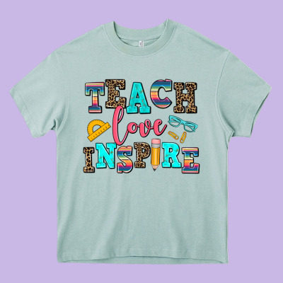 Teach Love Inspire Heavy Core Tee Designed By Adodesignshop