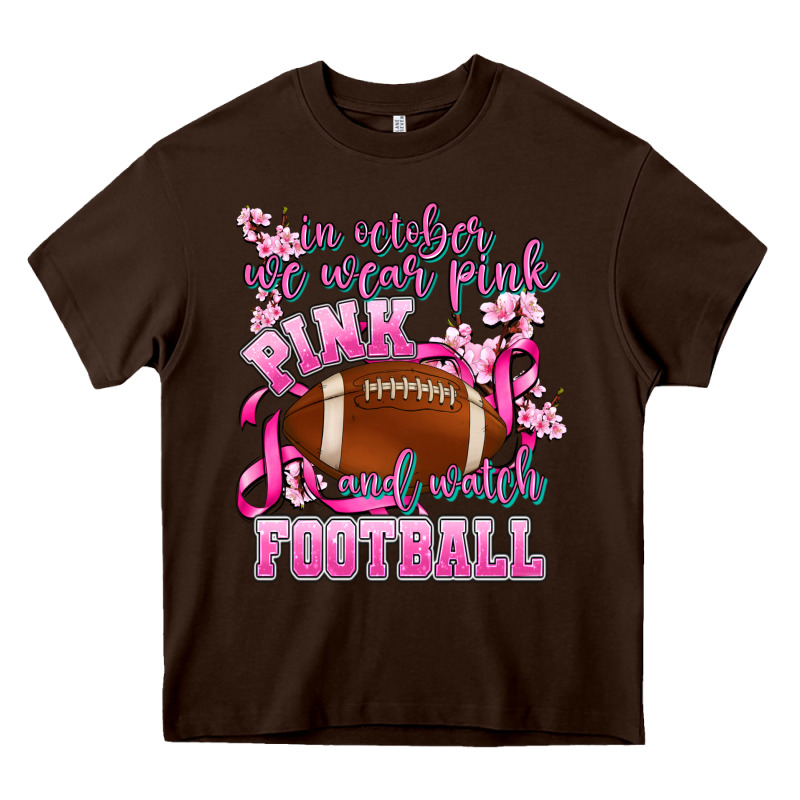 In October We Wear Pink And Watch Football Heavy Core Tee by AdoDesignShop | Teevron