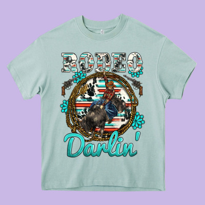 Western Rodeo Darlin' Bullfighter Serape Cowhide Turquoise Gemstones Heavy Core Tee Designed By Barkaloodesign