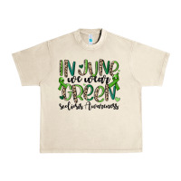 Sandshell in june we wear green scoliosis awareness Urban Heavy Tee - MaliasSmallBusiness
