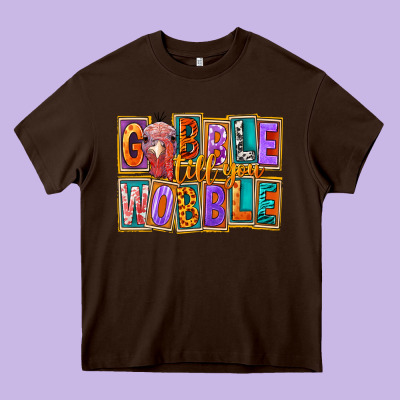 Gobble Till You Wobble Heavy Core Tee Designed By Fadigitalartstudio