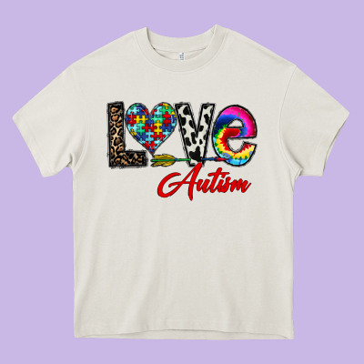 Love Autism Heavy Core Tee Designed By Cowhidedigitalart