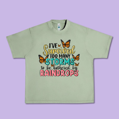 I Have Survived Too Many Storms To Be Bothered By Raindrops Malia Urban Heavy Tee Designed By Maliassmallbusiness