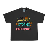 Pigment Black i have survived too many storms to be bothered by raindrops malia Urban Heavy Tee - MaliasSmallBusiness