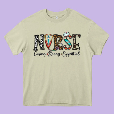 Nurse Caring Strong Essential Heavy Core Tee Designed By Cowhidedigitalart