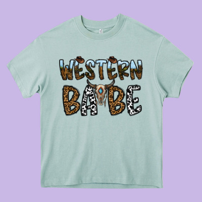 Western Babe Heavy Core Tee Designed By Cowhidedigitalart