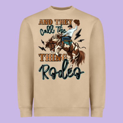 And They Call The Thing Rodeo Cowboy Heavyweight Sweatshirt Designed By Maliassmallbusiness