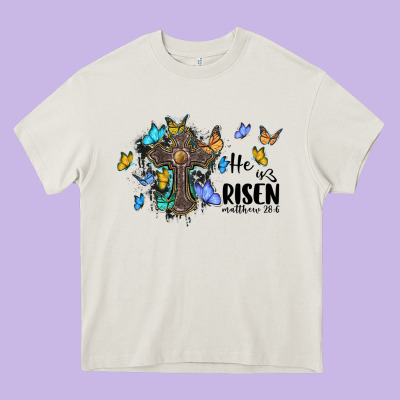 He Is Risen Matthew 28 6 Cross With Butterflies Cowhide Background Heavy Core Tee Designed By Barkaloodesign