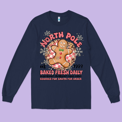 North Pole Baked Fresh Daily Long Sleeve Tee Designed By Maliassmallbusiness