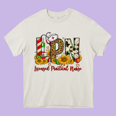Christmas Lpn Licensed Practical Nurse Heavy Core Tee Designed By Fadigitalartstudio