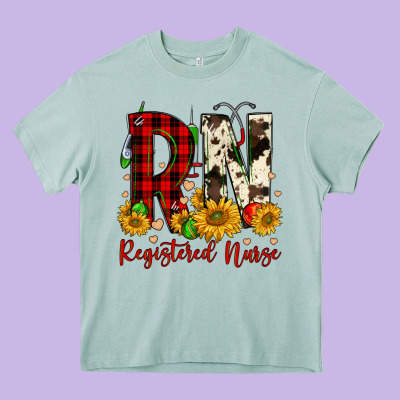 Christmas Rn Registered Nurse Heavy Core Tee Designed By Fadigitalartstudio