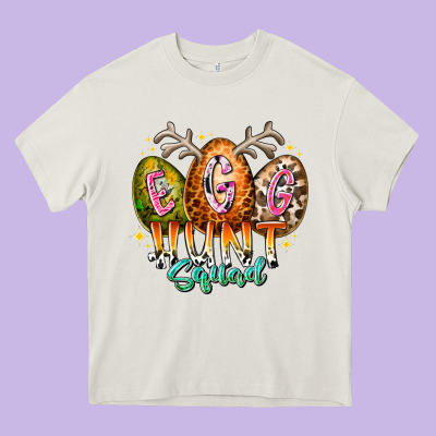Egg Hunt Squad Heavy Core Tee Designed By Racoondesign
