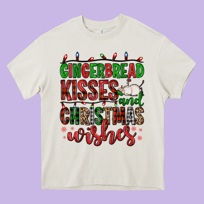 Gingerbread Kisses And Christmas Wishes Heavy Core Tee Designed By Fadigitalartstudio