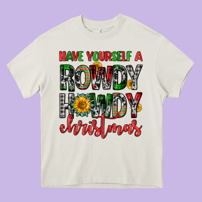 Have Yourself A Rowdy Howdy Christmas Heavy Core Tee Designed By Fadigitalartstudio