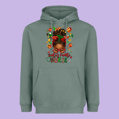 Santa's Favorite Nurse Afro Messy Bun Heavyweight Hoodie Designed By Texasbilliewilder