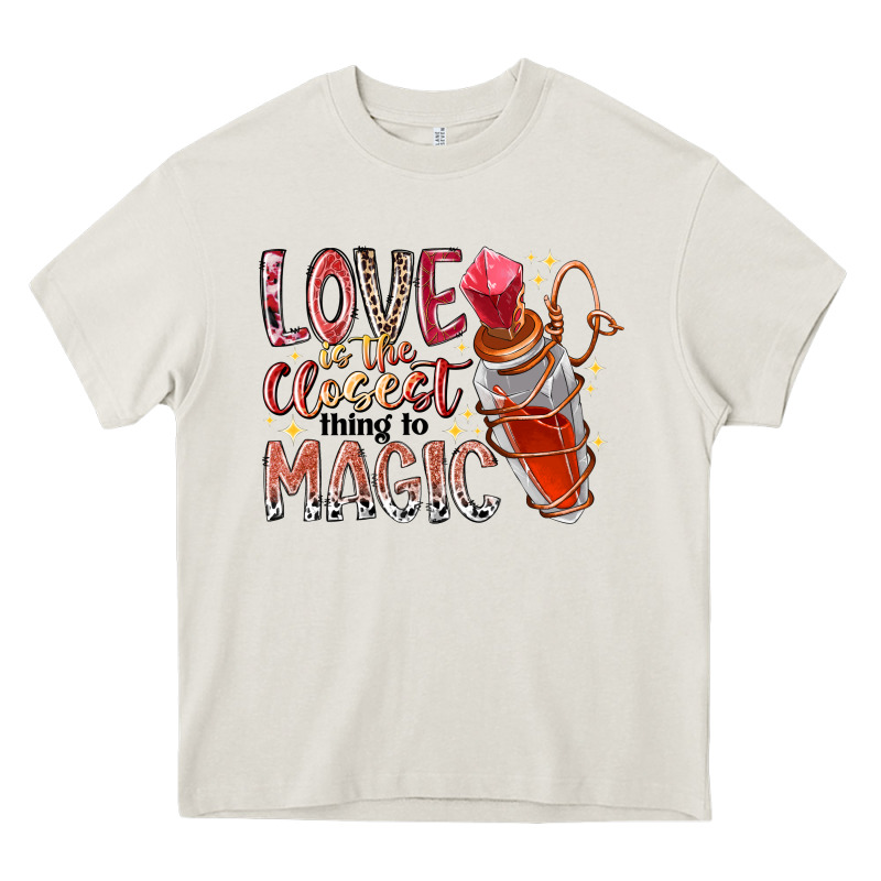 Love Is The Closet Thing To Magic Heavy Core Tee by RacoonDesign | Teevron