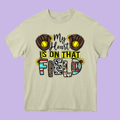 My Heart Is On That Field Heavy Core Tee Designed By Cowhidedigitalart