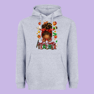 Santa's Favorite Teacher Afro Messy Bun Heavyweight Hoodie Designed By Texasbilliewilder