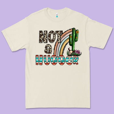 Not A Hugger Premium Tee Designed By Cowhidedigitalart