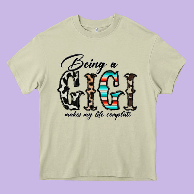 Being A Gigi Makes My Life Complate Heavy Core Tee Designed By Cowhidedigitalart
