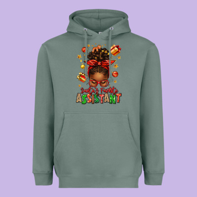 Santa's Favorite Assistant Afro Messy Bun Heavyweight Hoodie Designed By Texasbilliewilder