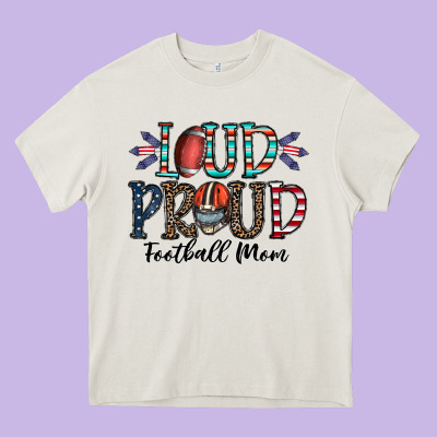 Loud Proud Football Mom Heavy Core Tee Designed By Cowhidedigitalart