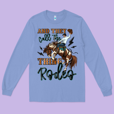 And They Call The Thing Rodeo Cowboy Long Sleeve Tee Designed By Maliassmallbusiness
