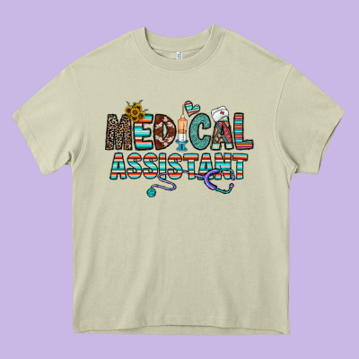 Medical Asistant Heavy Core Tee Designed By Cowhidedigitalart