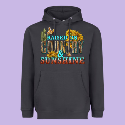 Raised On Country And Sunshine Heavyweight Hoodie Designed By Texasbilliewilder