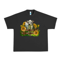 Pigment Black charolais heifer with sunflowers Urban Heavy Tee - LillyAllenDesigns