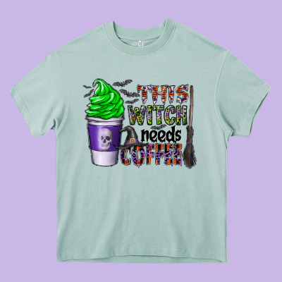 This Witch Needs Coffee Heavy Core Tee Designed By Cowhidedigitalart