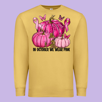 In October We Wear Pink With Pumpkin Premium Sweatshirt Designed By Texasbilliewilder