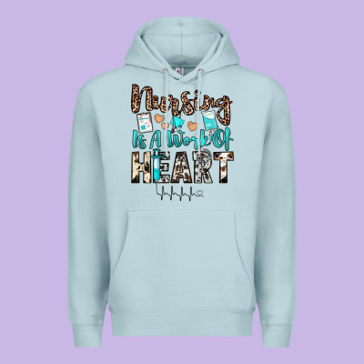 Nursing Is A Work Of Heart Premium Hoodie Designed By Jahusdesignshop