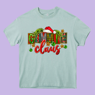 Christmas Gimmie Claus Heavy Core Tee Designed By Fadigitalartstudio