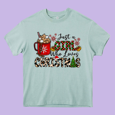 Just A Girl Who Loves Christmas Heavy Core Tee Designed By Cowhidedigitalart