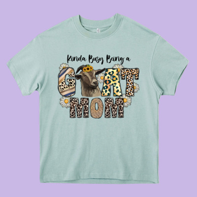 Kinda Busy Being A Goat Mom Heavy Core Tee Designed By Cowhidedigitalart