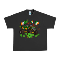 Pigment Black monster truck with shamrocks Urban Heavy Tee - AdoDesignShop