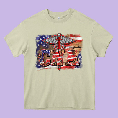 Patriotic Nurse Certified Nurse  Assistant Medilcal Symbol  Background Heavy Core Tee Designed By Barkaloodesign