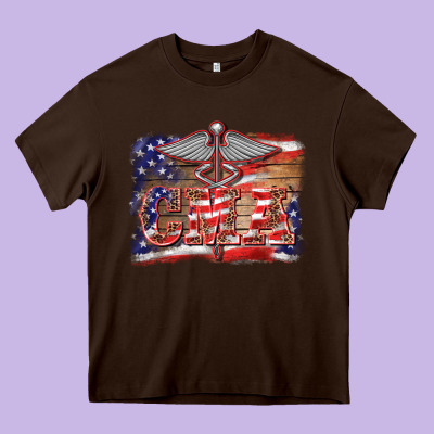 Patriotic Nurse Certified Medical Assistant Medilcal Symbol Background Heavy Core Tee Designed By Barkaloodesign