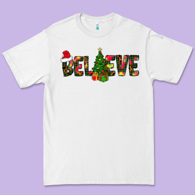Believe Christmas Premium Tee Designed By Cowhidedigitalart