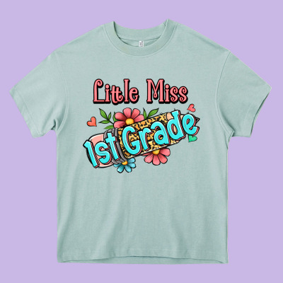 Little Miss First Grade Heavy Core Tee Designed By Ranaportraitstore
