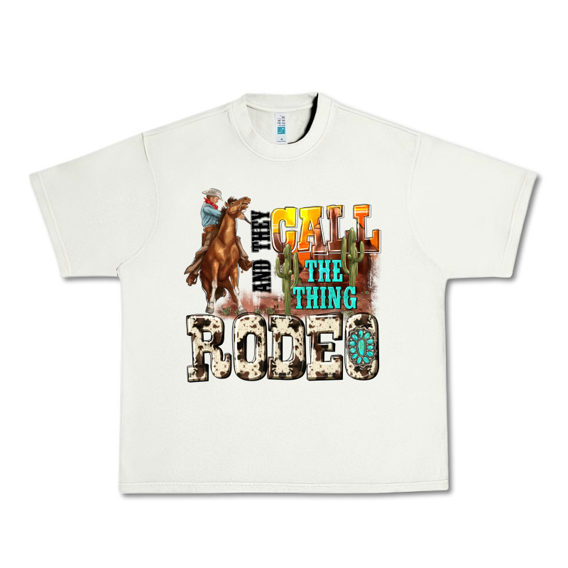 And They Call The Thing Rodeo Urban Heavy Tee by NancyCooperArtShop | Teevron