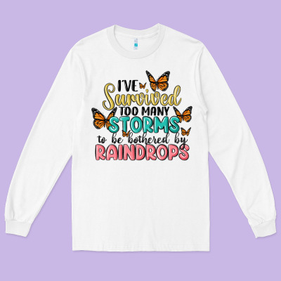 I Have Survived Too Many Storms To Be Bothered By Raindrops Malia Long Sleeve Tee Designed By Maliassmallbusiness