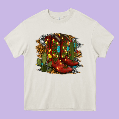 Christmas Cowboy Boots Heavy Core Tee Designed By Ranaportraitstore