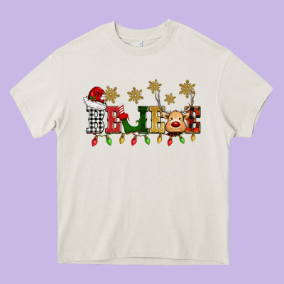 Christmas Believe Heavy Core Tee Designed By Barkaloodesign