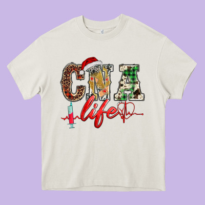 Christmas Certified Nurse  Assistant Life Heavy Core Tee Designed By Barkaloodesign