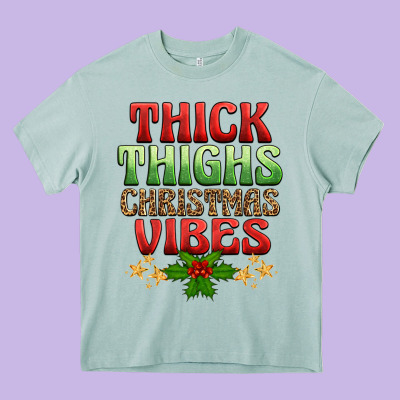 Thick Thighs Christmas Vibes Heavy Core Tee Designed By Barkaloodesign