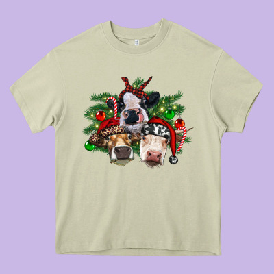 Christmas Cows With Tree Heavy Core Tee Designed By Ranaportraitstore