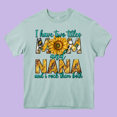 I Have Two Titles Mom And Nana And I Rock Them Bot Heavy Core Tee Designed By Texasbilliewilder