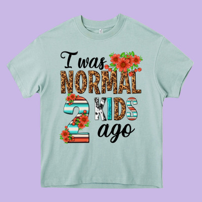 I Was Normal Two Kids Ago Heavy Core Tee Designed By Texasbilliewilder